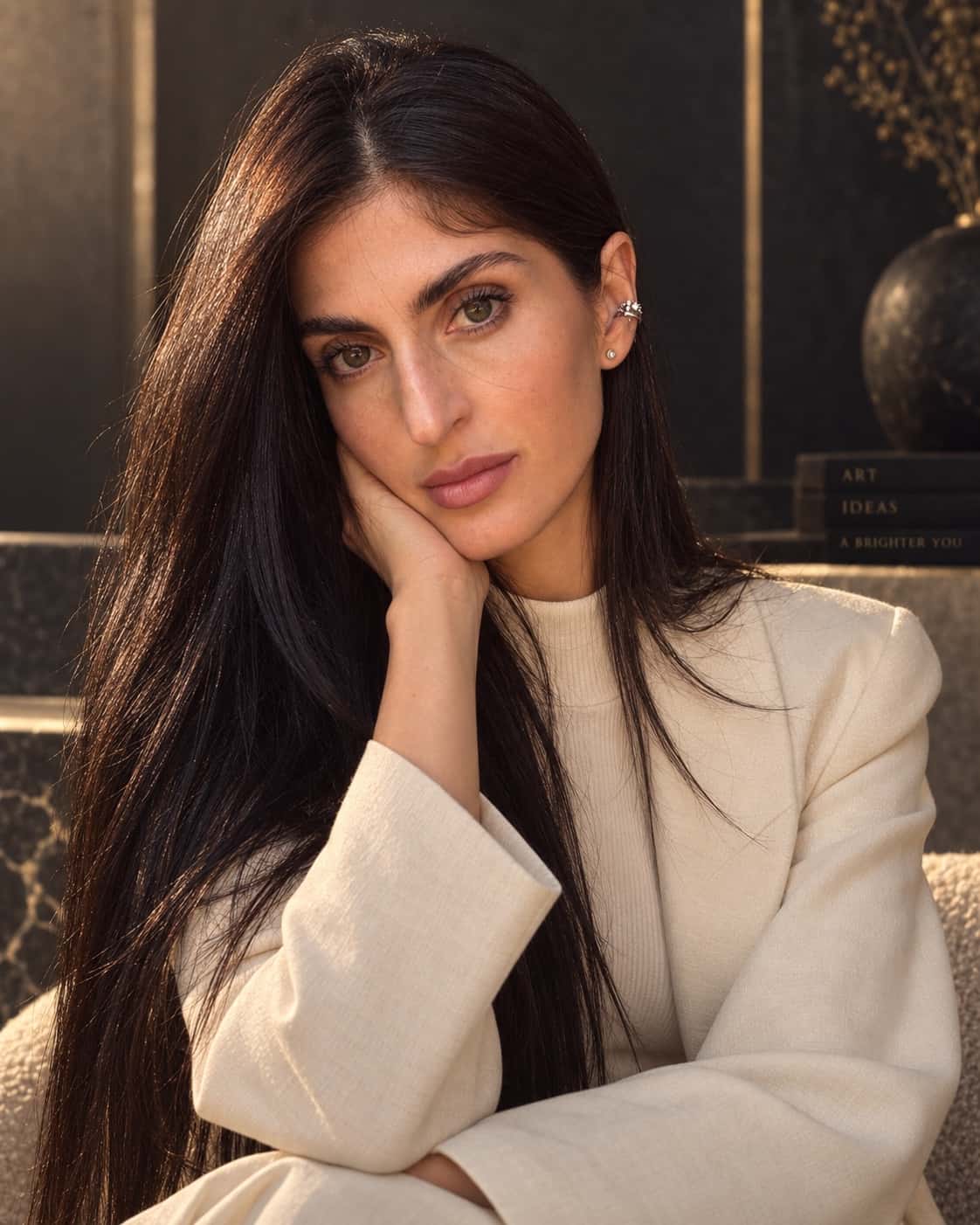 Portrait of Kristina Ellarian in a white suit